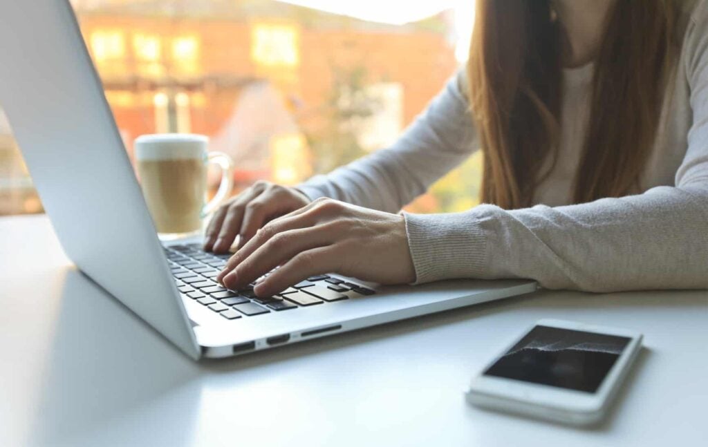 searching for job openings on a laptop